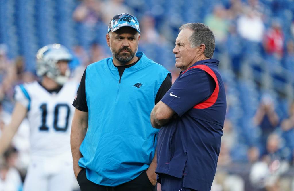 Aug 19, 2022; Foxborough, Massachusetts, USA; New England Patriots head coach Bill Belichick and Carolina Panthers head coach Matt Rhule on the field before the start of the game at Gillette Stadium. Credit: David Butler II-USA TODAY Sports