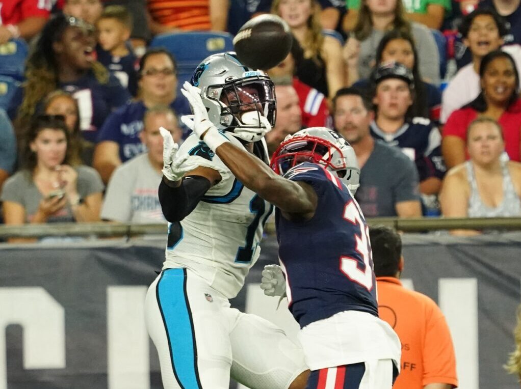 Aug 19, 2022; Foxborough, Massachusetts, USA; New England Patriots cornerback Jonathan Jones (31) defends against Carolina Panthers wide receiver Keith Kirkwood (19) in the first half at Gillette Stadium. Credit: David Butler II-USA TODAY Sports