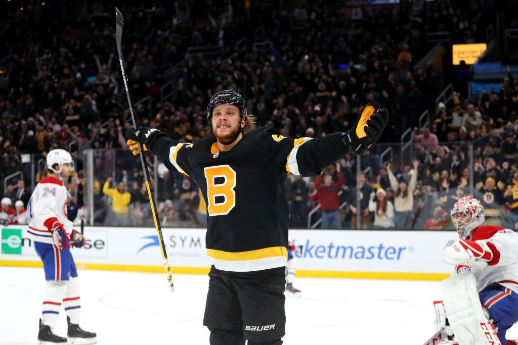 BOSTON, MASSACHUSETTS - DECEMBER 01: David Pastrnak #88 of the Boston Bruins celebrates after scoring a goal against the Montreal Canadiens during the third period at TD Garden on December 01, 2019 in Boston, Massachusetts. The Bruins defeat the Canadiens 3-1. (Photo by Maddie Meyer/Getty Images)
