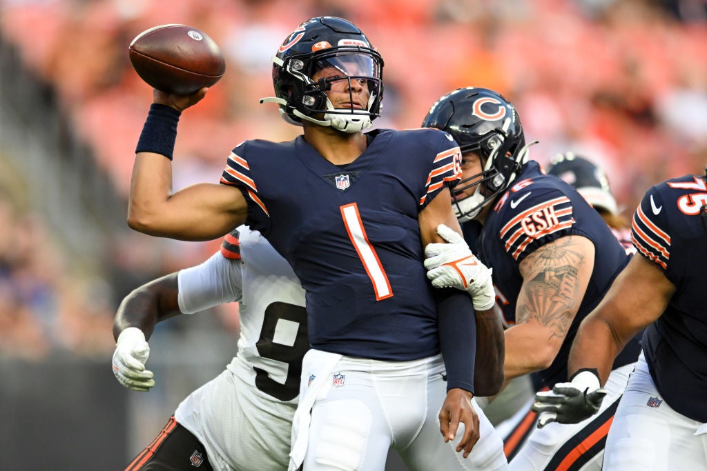 CLEVELAND, OH - AUGUST 27: Justin Fields #1 of the Chicago Bears throws as he is pressured by Alex Wright #94 of the Cleveland Browns during the first half of a preseason game at FirstEnergy Stadium on August 27, 2022 in Cleveland, Ohio. (Photo by Nick Cammett/Getty Images)