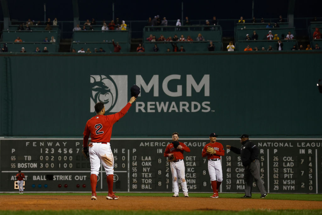 BOSTON, MA - OCTOBER 5: Xander Bogaerts #2 of the Boston Red Sox tips his cap to the crowd after he is removed from the game the seventh inning against the Tampa Bay Rays at Fenway Park on October 5, 2022 in Boston, Massachusetts. (Photo By Winslow Townson/Getty Images)