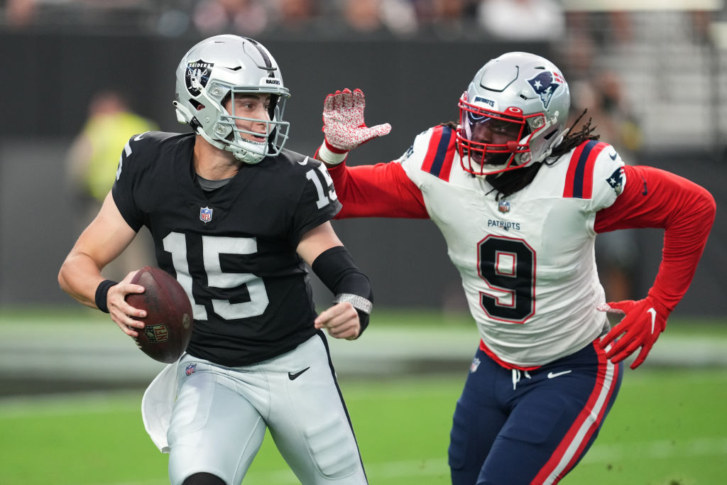 LAS VEGAS, NEVADA - AUGUST 26: Linebacker Matthew Judon #9 of the New England Patriots rushes quarterback Chase Garbers #15 of the Las Vegas Raiders during the first half of a preseason game at Allegiant Stadium on August 26, 2022 in Las Vegas, Nevada. (Photo by Chris Unger/Getty Images)