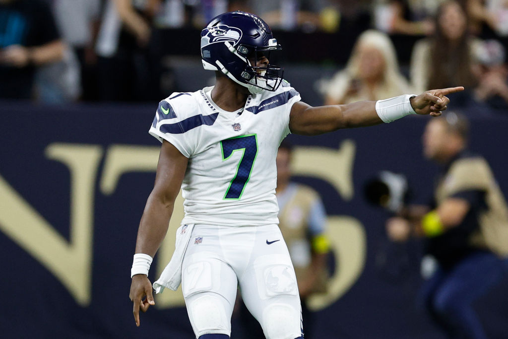 NEW ORLEANS, LOUISIANA - OCTOBER 09: Geno Smith #7 of the Seattle Seahawks reacts after a touchdown during the first half of the game against the New Orleans Saints at Caesars Superdome on October 09, 2022 in New Orleans, Louisiana. (Photo by Chris Graythen/Getty Images)