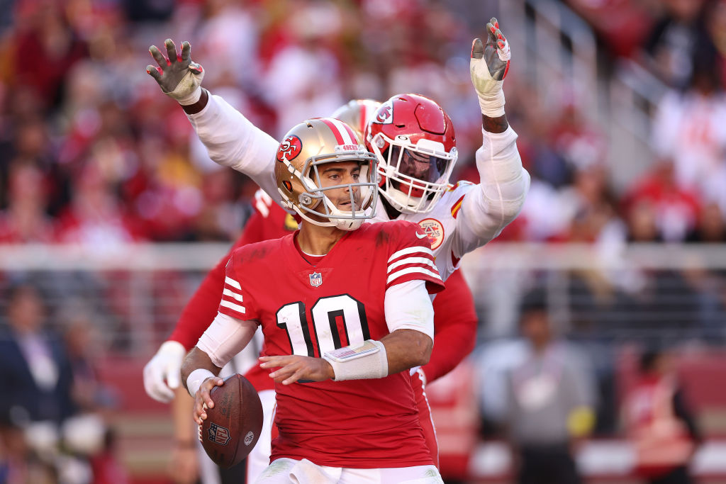 SANTA CLARA, CALIFORNIA - OCTOBER 23: Frank Clark #55 of the Kansas City Chiefs tackles Jimmy Garoppolo #10 of the San Francisco 49ers in the endzone for a safety in the fourth quarter at Levi's Stadium on October 23, 2022 in Santa Clara, California. (Photo by Ezra Shaw/Getty Images)