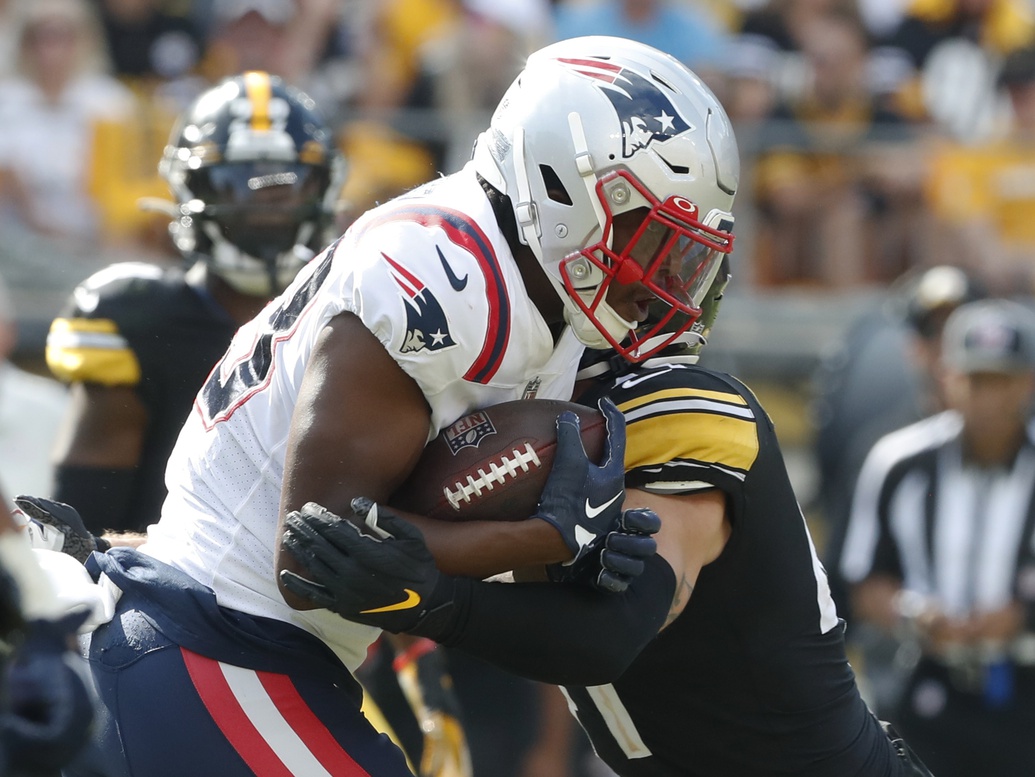 Sep 18, 2022; Pittsburgh, Pennsylvania, USA; New England Patriots wide receiver Lil'Jordan Humphrey (83) runs after a catch as Pittsburgh Steelers linebacker Robert Spillane (41) defends during the fourth quarter at Acrisure Stadium. The Patriots won 17-14. Credit: Charles LeClaire-USA TODAY Sports