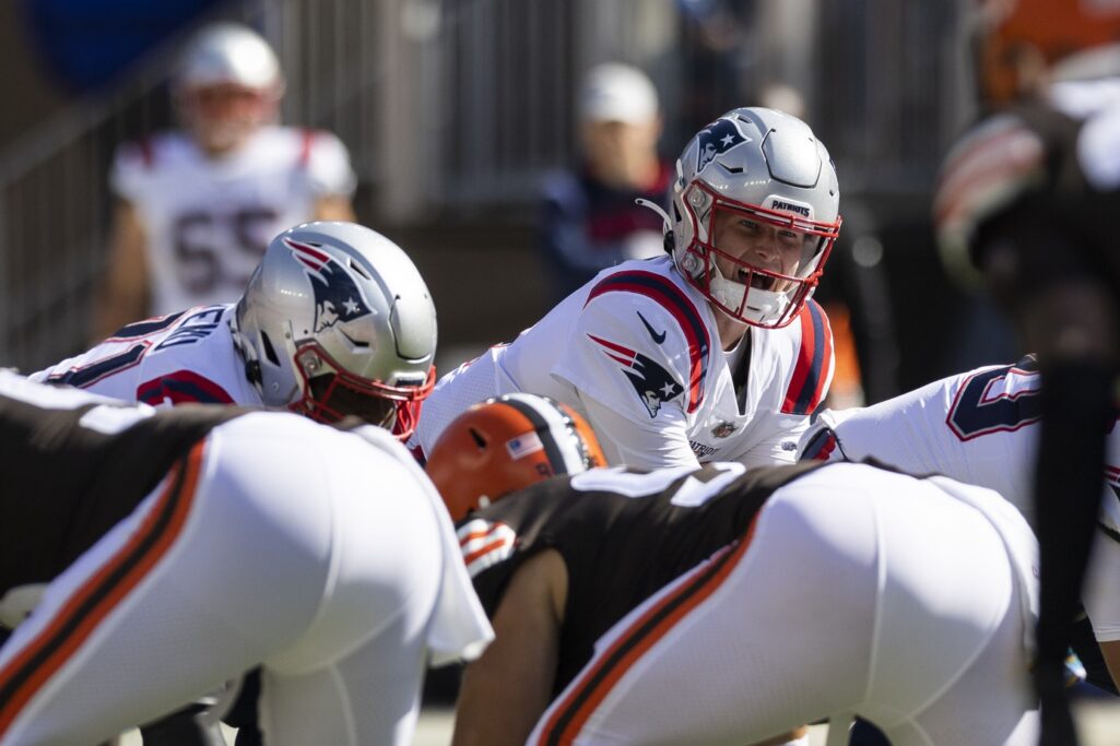 Oct 16, 2022; Cleveland, Ohio, USA; New England Patriots quarterback Bailey Zappe (4) lines up for the snap against the Cleveland Browns during the first quarter at FirstEnergy Stadium. Credit: Scott Galvin-USA TODAY Sports