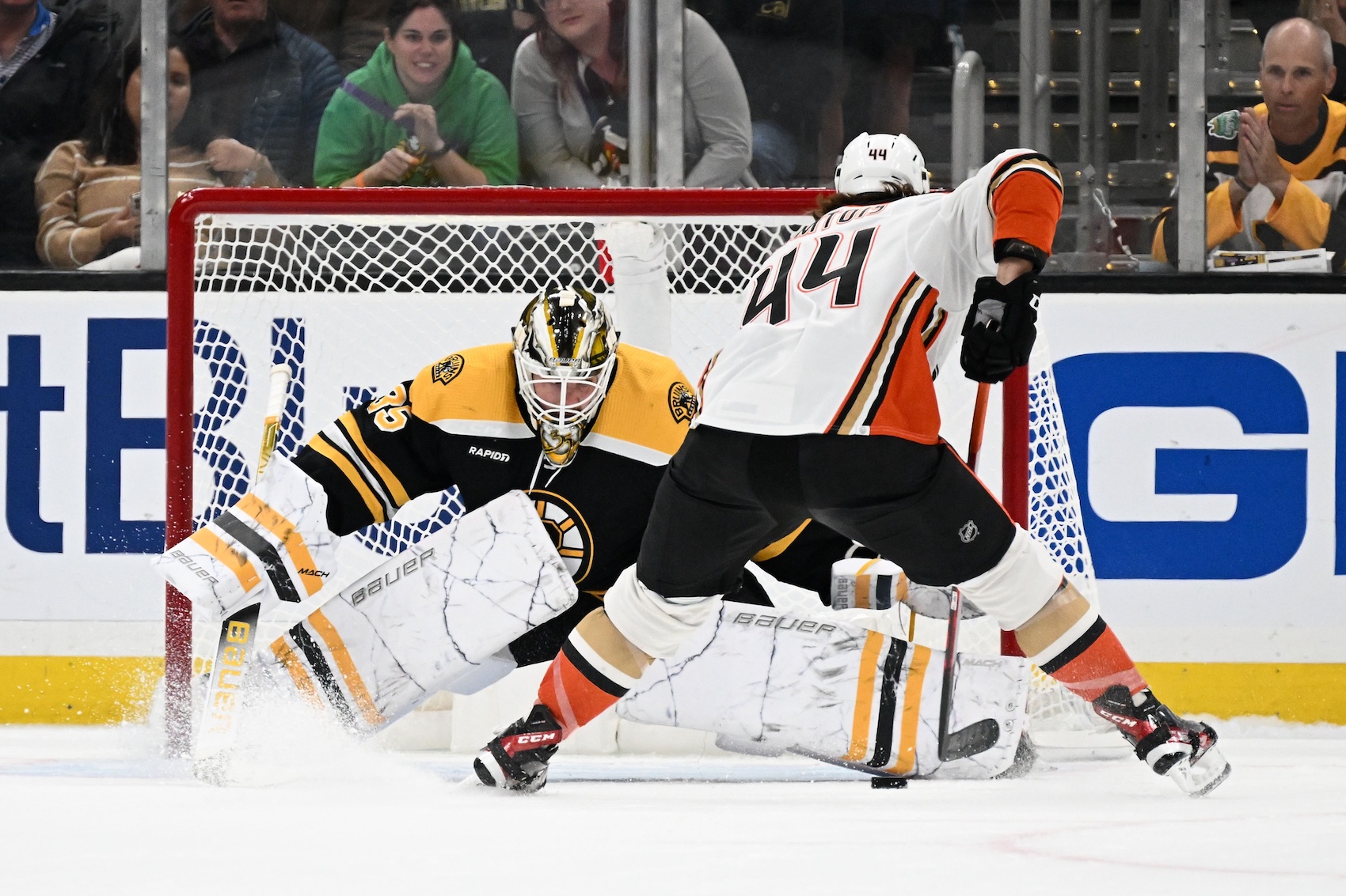 Oct 20, 2022; Boston, Massachusetts, USA; Boston Bruins goaltender Linus Ullmark (35) blocks a shot from Anaheim Ducks left wing Max Comtois (44) during a shootout at the TD Garden. Mandatory Credit: Brian Fluharty/USA TODAY Sports