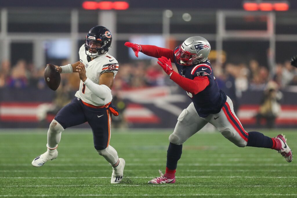 Oct 24, 2022; Foxborough, Massachusetts, USA; New England Patriots outside linebacker Matt Judon (9) chase down Chicago Bears quarterback Justin Fields (1) during the first half at Gillette Stadium. Credit: Paul Rutherford-USA TODAY Sports