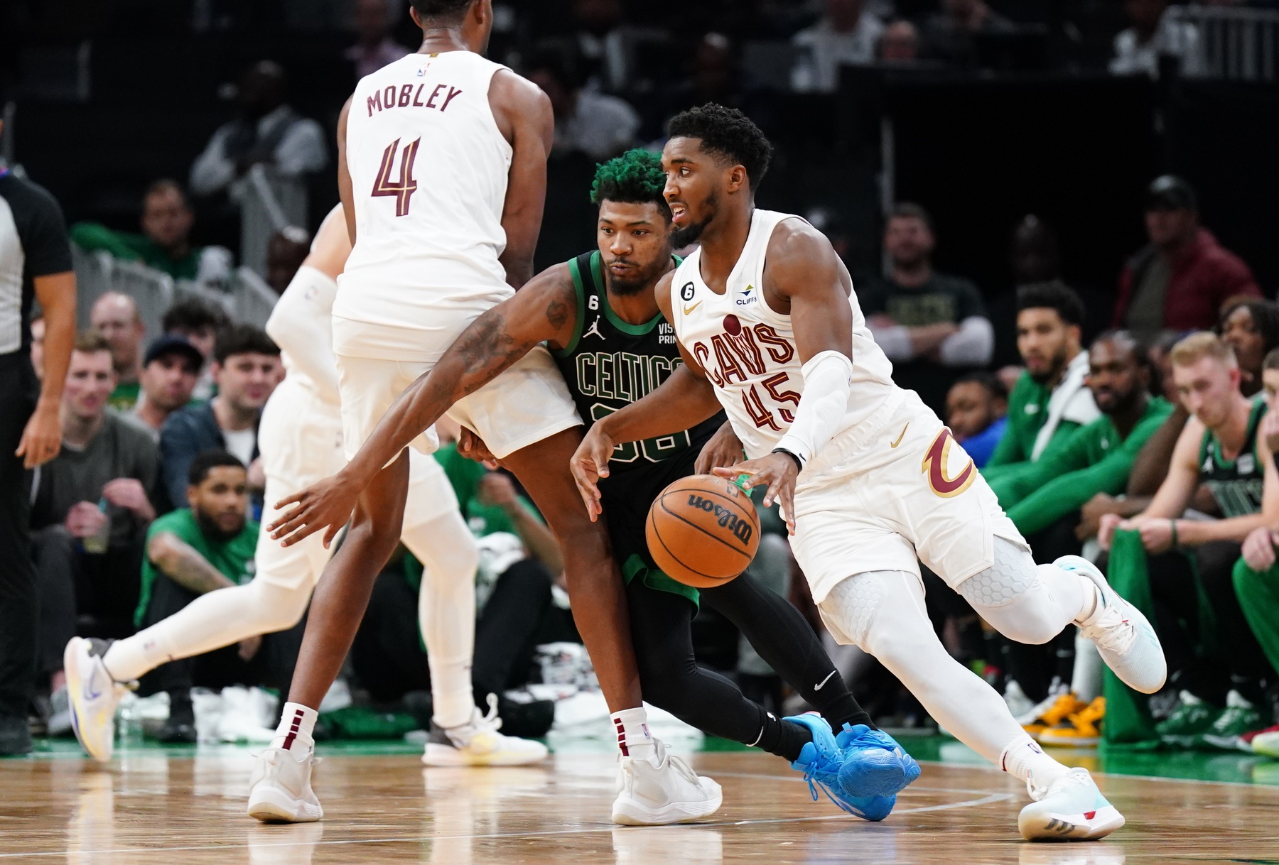 Oct 28, 2022; Boston, Massachusetts, USA; Cleveland Cavaliers guard Donovan Mitchell (45) drives the ball against Boston Celtics guard Marcus Smart (36) in the second half at TD Garden. Mandatory Credit: David Butler II/USA TODAY Sports