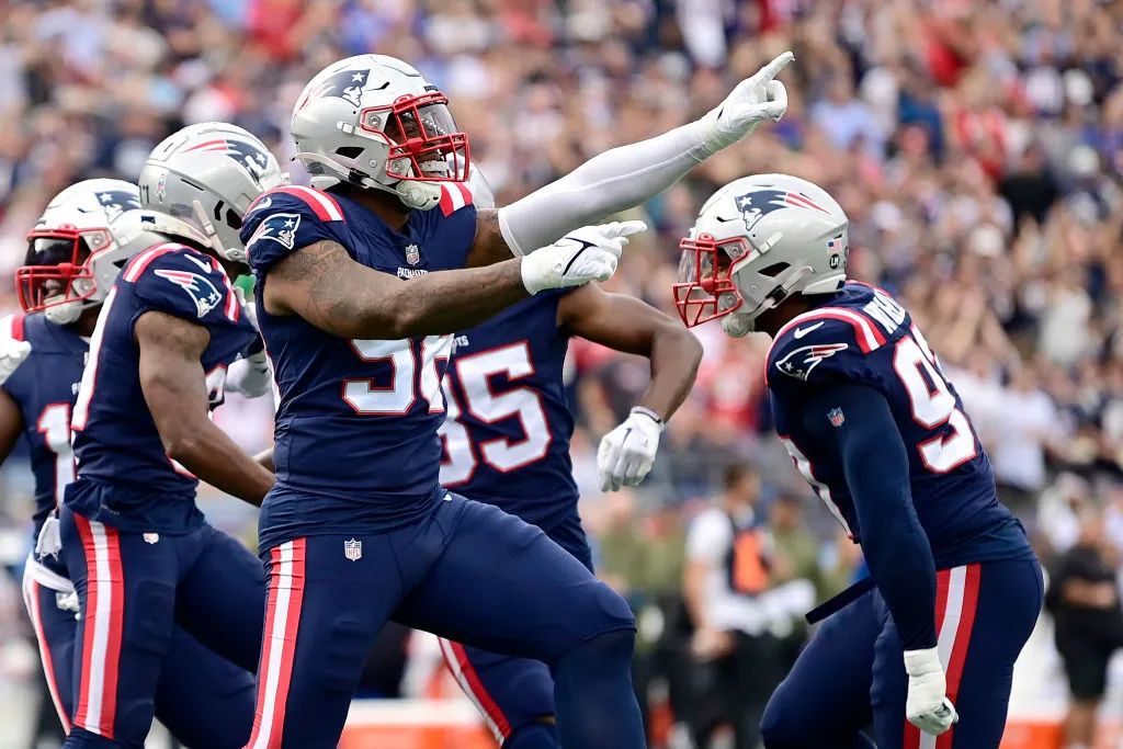 August 19, 2022; Foxborough, MA, USA; New England Patriots running back  J.J. Taylor (42) avoids a tackle during the NFL pre-season game between  Carolina Panthers and New England Patriots at Gillette Stadium.