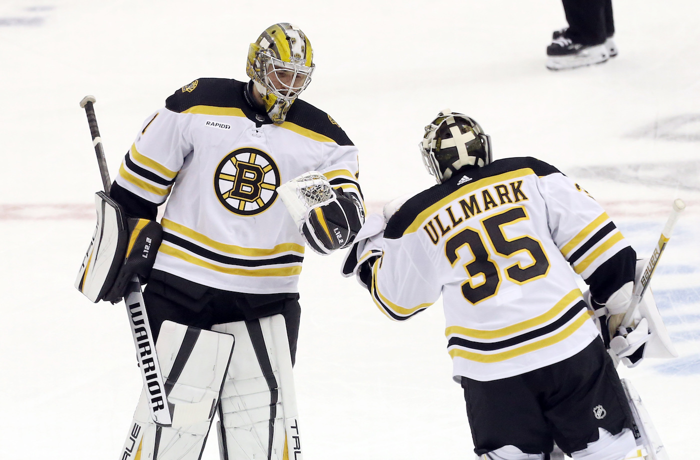 Nov 1, 2022; Pittsburgh, Pennsylvania, USA;  Boston Bruins goaltender Jeremy Swayman (left) replaces goaltender Linus Ullmark (35) in the net against the Pittsburgh Penguins during the second period at PPG Paints Arena. Mandatory Credit: Charles LeClaire/USA TODAY Sports