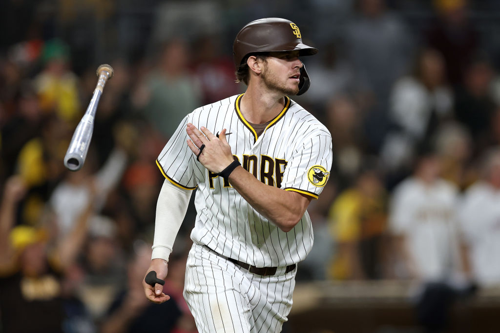 SAN DIEGO, CALIFORNIA - OCTOBER 03: Wil Myers #5 of the San Diego Padres tosses his bat after hitting a three-run homerun during the eighth inning of a game against the San Francisco Giants at PETCO Park on October 03, 2022 in San Diego, California. (Photo by Sean M. Haffey/Getty Images)