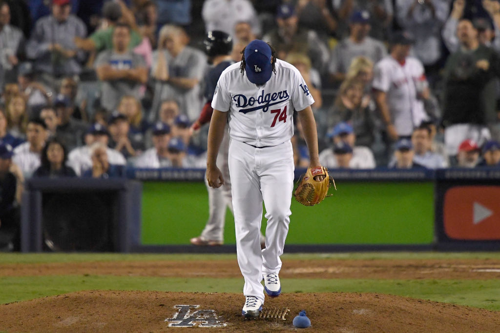 LOS ANGELES, CA - OCTOBER 27: Pitcher Kenley Jansen #74 of the Los Angeles Dodgers looks down at the mound after giving up a solo home run to tie the game at 4-4 to Steve Pearce #25 of the Boston Red Sox (on his way to home plate) in the eighth inning of Game Four of the 2018 World Series at Dodger Stadium on October 27, 2018 in Los Angeles, California. (Photo by Kevork Djansezian/Getty Images)