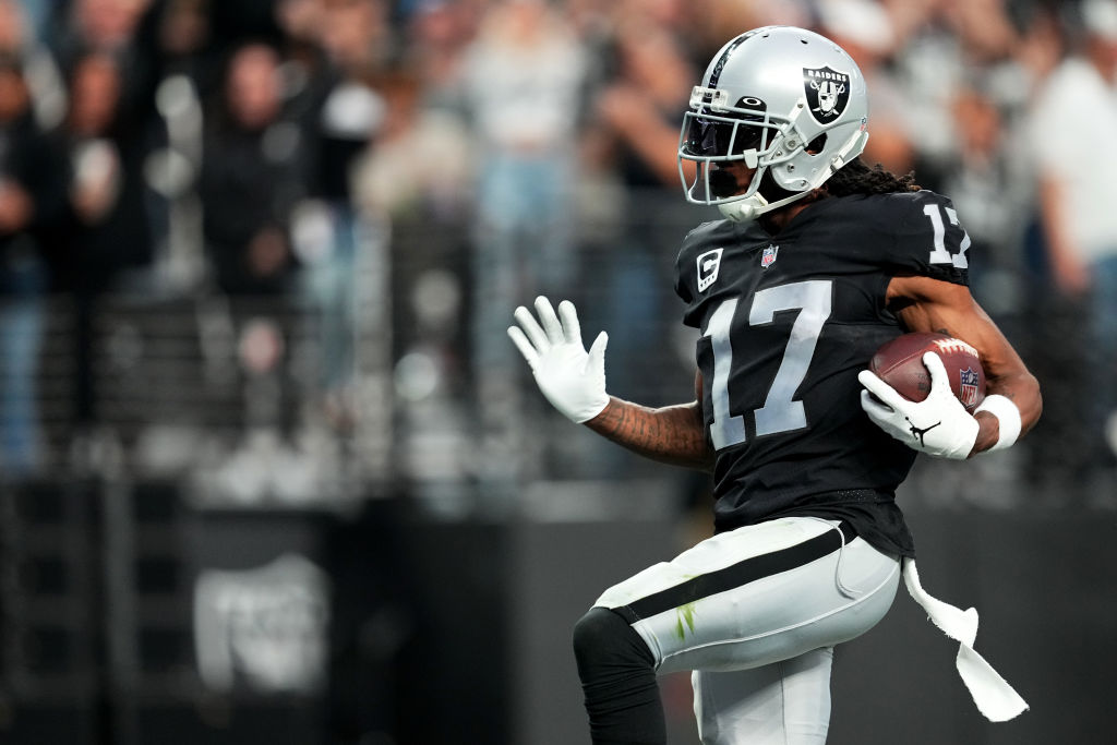 LAS VEGAS, NEVADA - DECEMBER 04: Davante Adams #17 of the Las Vegas Raiders scores a touchdown in the third quarter of a game against the Los Angeles Chargers at Allegiant Stadium on December 04, 2022 in Las Vegas, Nevada. (Photo by Chris Unger/Getty Images)