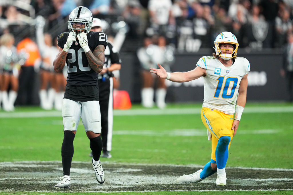 LAS VEGAS, NEVADA - DECEMBER 04: Justin Herbert #10 of the Los Angeles Chargers reacts in the fourth quarter of a game against the Las Vegas Raiders at Allegiant Stadium on December 04, 2022 in Las Vegas, Nevada. (Photo by Chris Unger/Getty Images)
