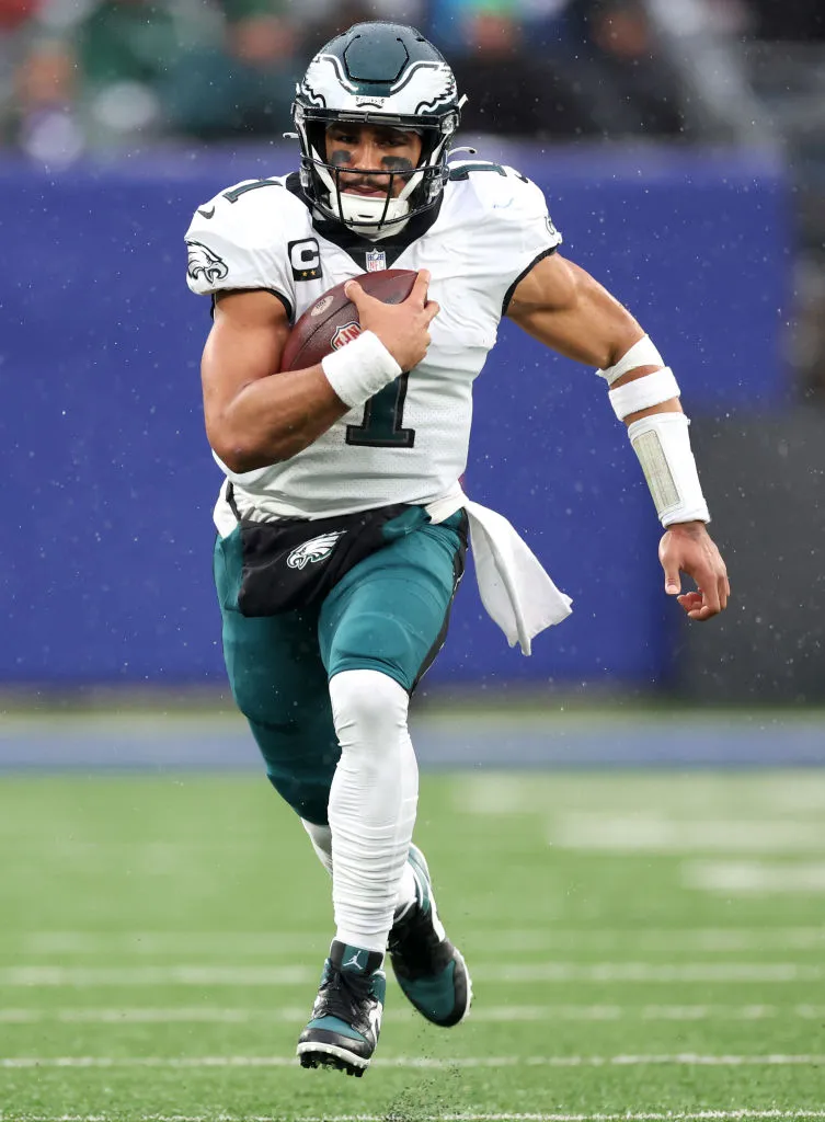 EAST RUTHERFORD, NEW JERSEY - DECEMBER 11: Jalen Hurts #1 of the Philadelphia Eagles runs the ball during the first half against the New York Giants at MetLife Stadium on December 11, 2022 in East Rutherford, New Jersey. (Photo by Al Bello/Getty Images)