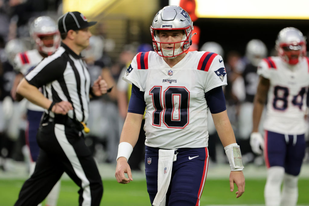 LAS VEGAS, NEVADA - DECEMBER 18: Mac Jones #10 of the New England Patriots reacts during the first half against the Las Vegas Raiders at Allegiant Stadium on December 18, 2022 in Las Vegas, Nevada. (Photo by Ethan Miller/Getty Images)