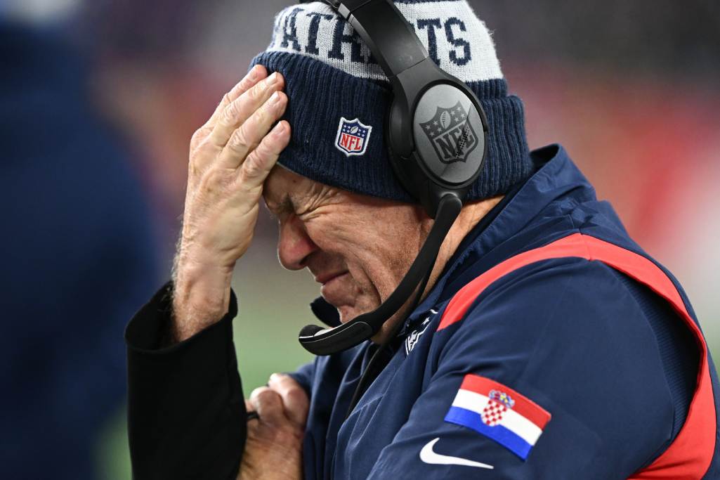 Dec 1, 2022; Foxborough, Massachusetts, USA; New England Patriots head coach Bill Belichick rubs his head during the fourth quarter of a game against the Buffalo Bills at Gillette Stadium. Credit: Brian Fluharty-USA TODAY Sports