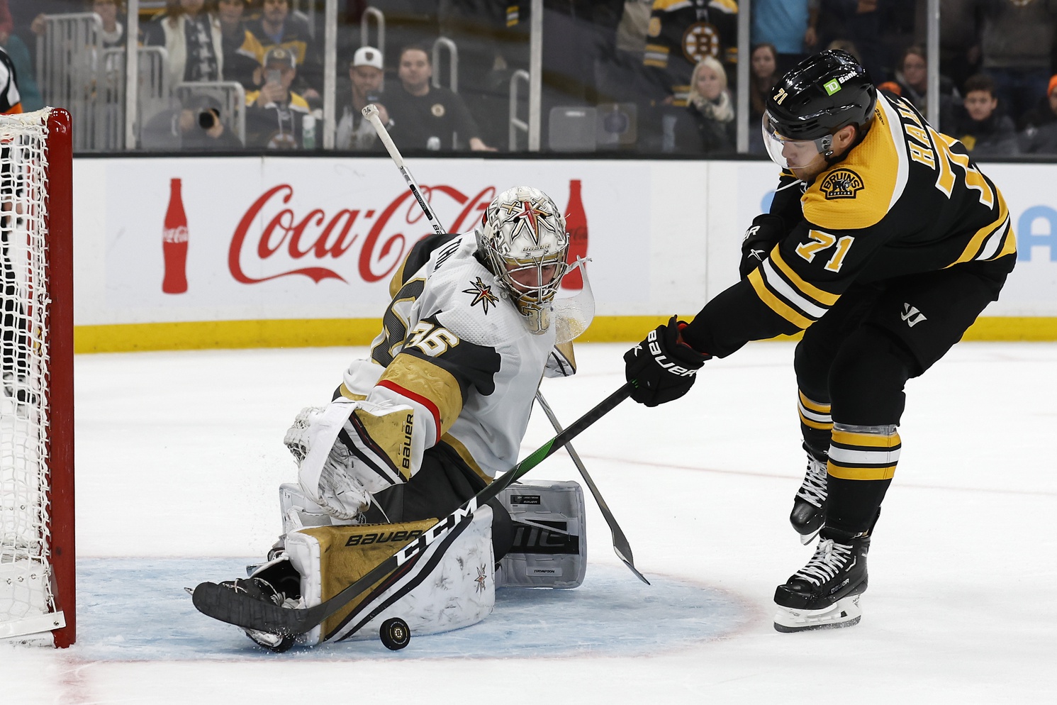 Dec 5, 2022; Boston, Massachusetts, USA; Vegas Golden Knights goaltender Logan Thompson (36) stops Boston Bruins left wing Taylor Hall (71) during a shootout at TD Garden. Mandatory Credit: Winslow Townson/USA TODAY Sports