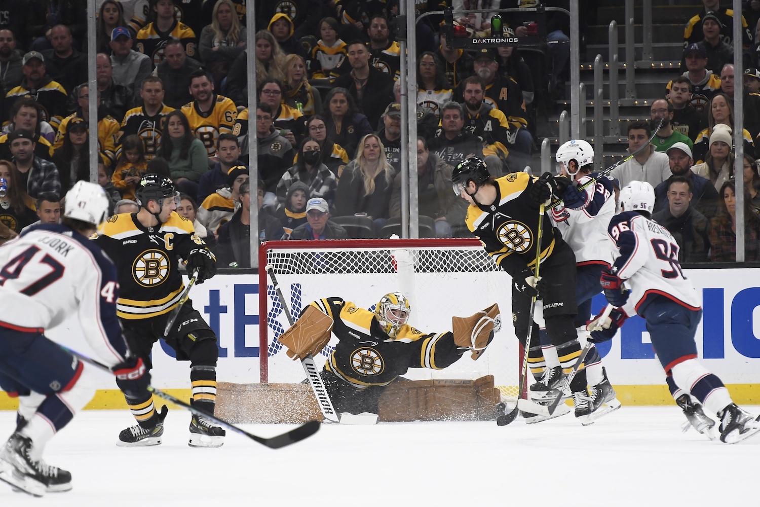 Dec 17, 2022; Boston, Massachusetts, USA;  Boston Bruins goaltender Jeremy Swayman (1) makes a glove save during the first period against the Columbus Blue Jackets at TD Garden. Mandatory Credit: Bob DeChiara/USA TODAY Sports