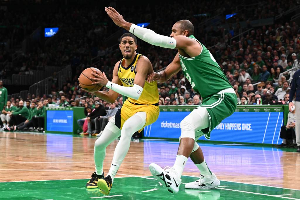 Dec 21, 2022; Boston, Massachusetts, USA; Indiana Pacers guard Tyrese Haliburton (0) drives to the basket against Boston Celtics center Al Horford (42) during the second quarter at the TD Garden. Credit: Brian Fluharty-USA TODAY Sports