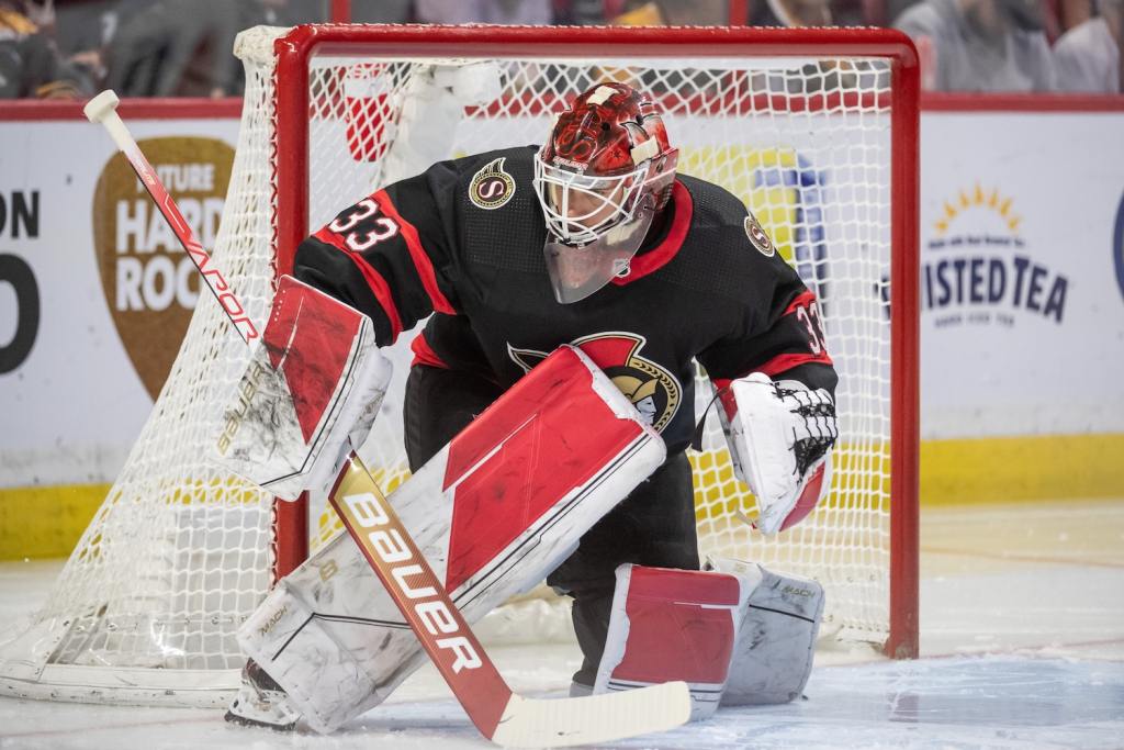 Dec 27, 2022; Ottawa, Ontario, CAN; Ottawa Senators goalie Cam Talbot (33) warms up prior to the start of the second period against the Boston Bruins at the Canadian Tire Centre. Mandatory Credit: Marc DesRosiers/USA TODAY Sports