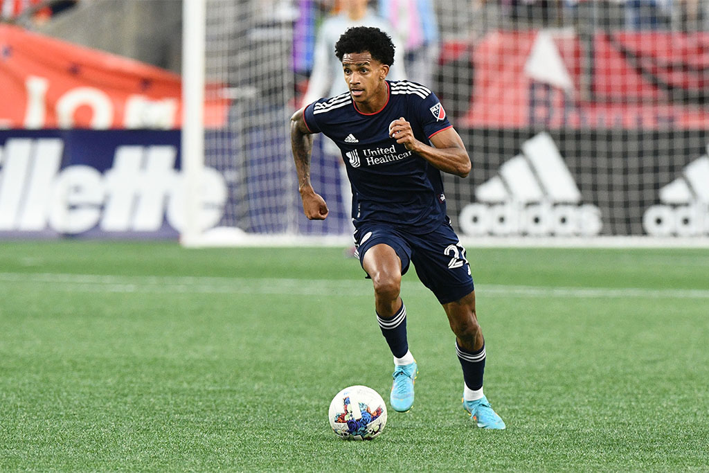 Jul 3, 2022; Foxborough, Massachusetts, USA; New England Revolution midfielder Dylan Borrero (27) dribbles the ball up the field during the first half of a match against FC Cincinnati at Gillette Stadium. Mandatory Credit: Brian Fluharty-USA TODAY Sports