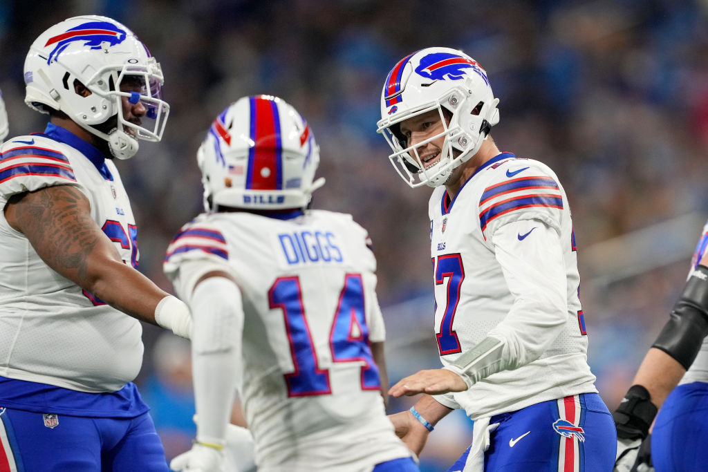 DETROIT, MICHIGAN - NOVEMBER 24: Josh Allen #17 of the Buffalo Bills celebrates after scoring a touchdown against the Detroit Lions during the second quarter at Ford Field on November 24, 2022 in Detroit, Michigan. (Photo by Nic Antaya/Getty Images)