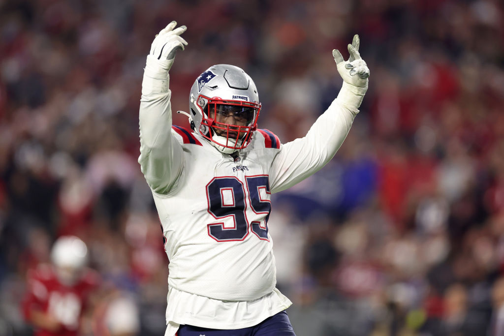 GLENDALE, ARIZONA - DECEMBER 12: Daniel Ekuale #95 of the New England Patriots celebrates after sacking Colt McCoy #12 of the Arizona Cardinals during the fourth quarter of the game at State Farm Stadium on December 12, 2022 in Glendale, Arizona. (Photo by Christian Petersen/Getty Images)