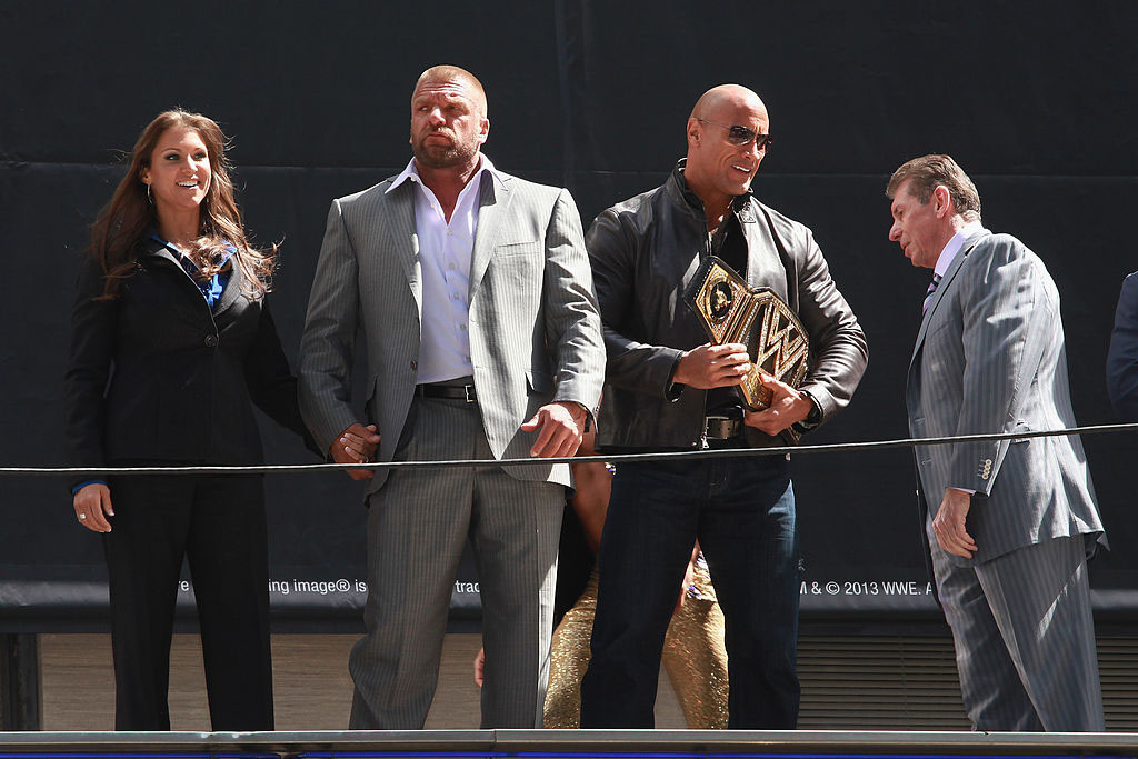 NEW YORK, NY - APRIL 04: Stephanie McMahon, Triple H, The Rock, and Vince McMahon attend the WrestleMania 29 Press Conference at Radio City Music Hall on April 4, 2013 in New York City. (Photo by Taylor Hill/Getty Images)