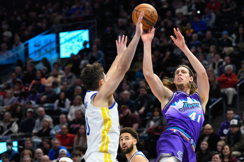 SALT LAKE CITY, UTAH - DECEMBER 07: Kelly Olynyk #41 of the Utah Jazz shoots over Ty Jerome #10 of the Golden State Warriors during the first half of the game at Vivint Arena on December 07, 2022 in Salt Lake City, Utah. NOTE TO USER: User expressly acknowledges and agrees that, by downloading and or using this photograph, User is consenting to the terms and conditions of the Getty Images License Agreement. (Photo by Alex Goodlett/Getty Images)