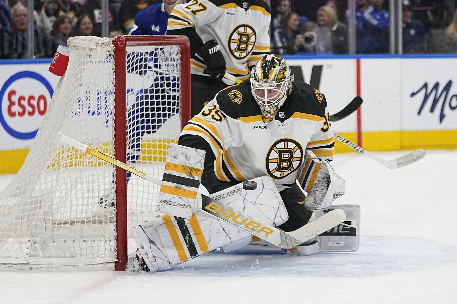 Feb 1, 2023; Toronto, Ontario, CAN; Boston Bruins goaltender Linus Ullmark (35) makes a save against the Toronto Maple Leafs during the first period at Scotiabank Arena. Mandatory Credit: John E. Sokolowski/USA TODAY Sports