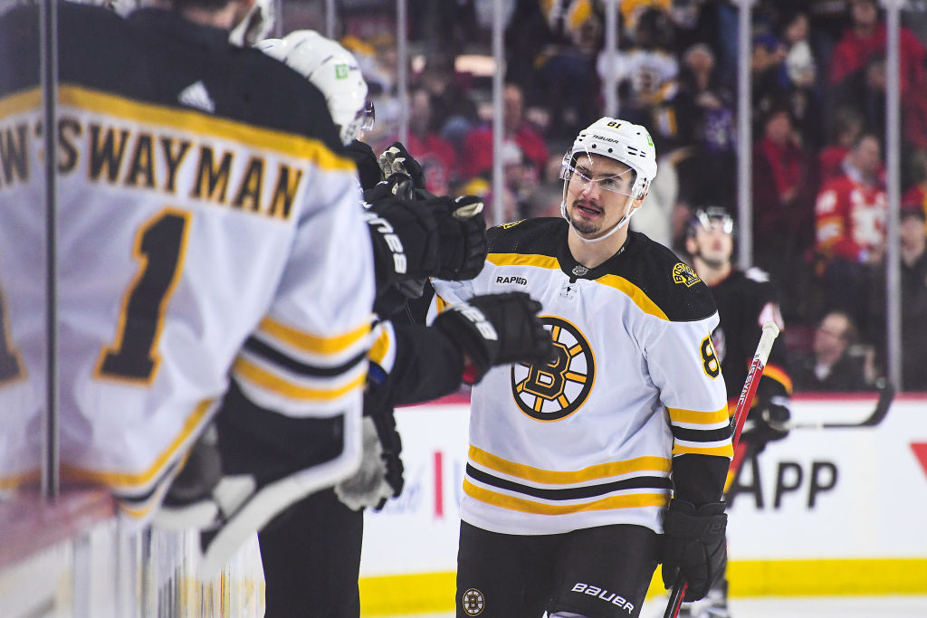 CALGARY, CANADA - FEBRUARY 28: Dmitri Orlov #81 of the Boston Bruins celebrates after scoring against the Calgary Flames during the first period of an NHL game at Scotiabank Saddledome on February 28, 2023 in Calgary, Alberta, Canada. (Photo by Derek Leung/Getty Images)