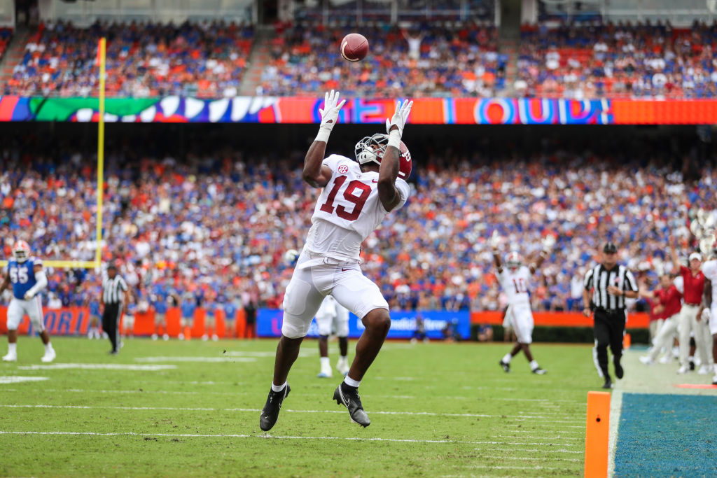 GAINESVILLE, FLORIDA - SEPTEMBER 18: Jahleel Billingsley #19 of the Alabama Crimson Tide scores a touchdown during the first quarter of a game against the Florida Gators at Ben Hill Griffin Stadium on September 18, 2021 in Gainesville, Florida. (Photo by James Gilbert/Getty Images)