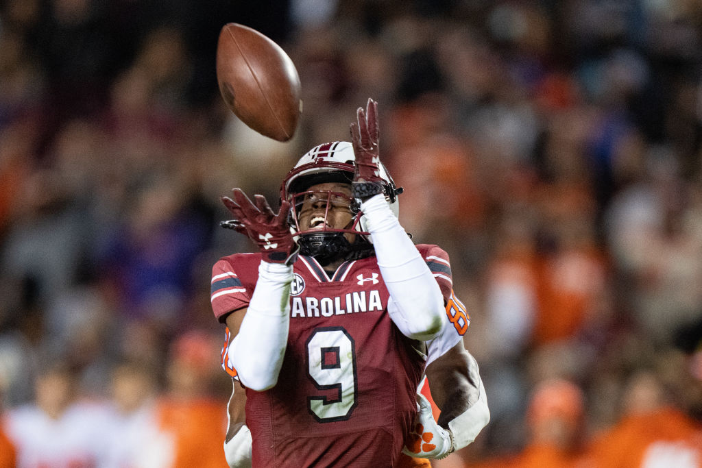 COLUMBIA, SOUTH CAROLINA - NOVEMBER 27: Defensive back Cam Smith #9 of the South Carolina Gamecocks makes an interception against the Clemson Tigers in the first quarter during their game at Williams-Brice Stadium on November 27, 2021 in Columbia, South Carolina. (Photo by Jacob Kupferman/Getty Images)