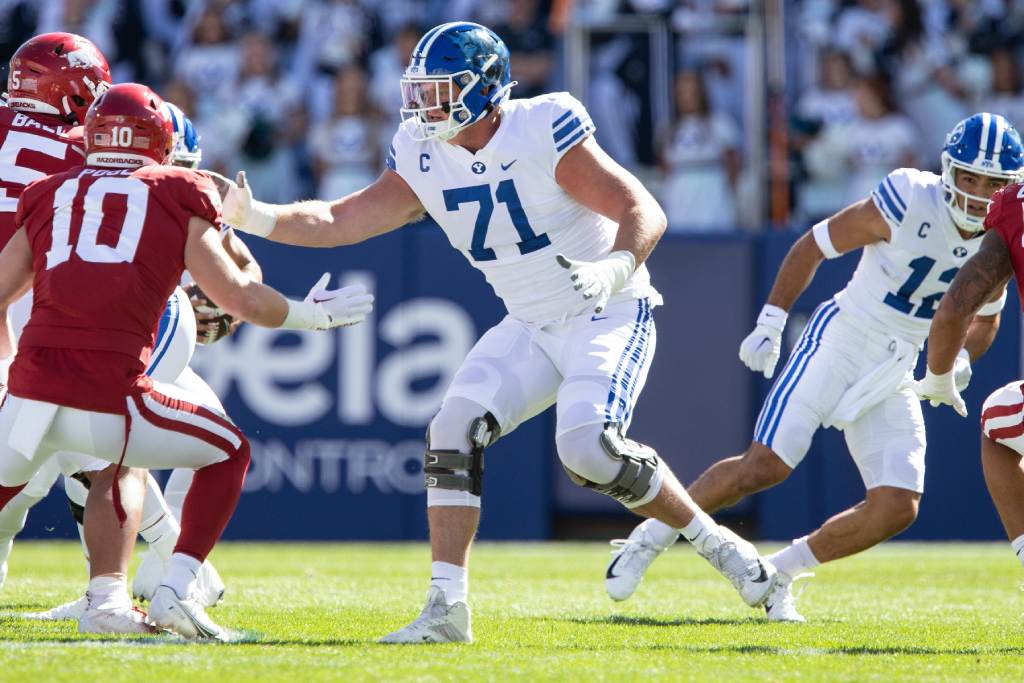 PROVO UT- OCTOBER 15: Blake Freeland #71 of the Brigham Young Cougars blocks against the Arkansas Razorbacks during the first half of their game on October 15, 2022 at LaVell Edwards Stadium in Provo, Utah. (Photo by Chris Gardner/Getty Images)