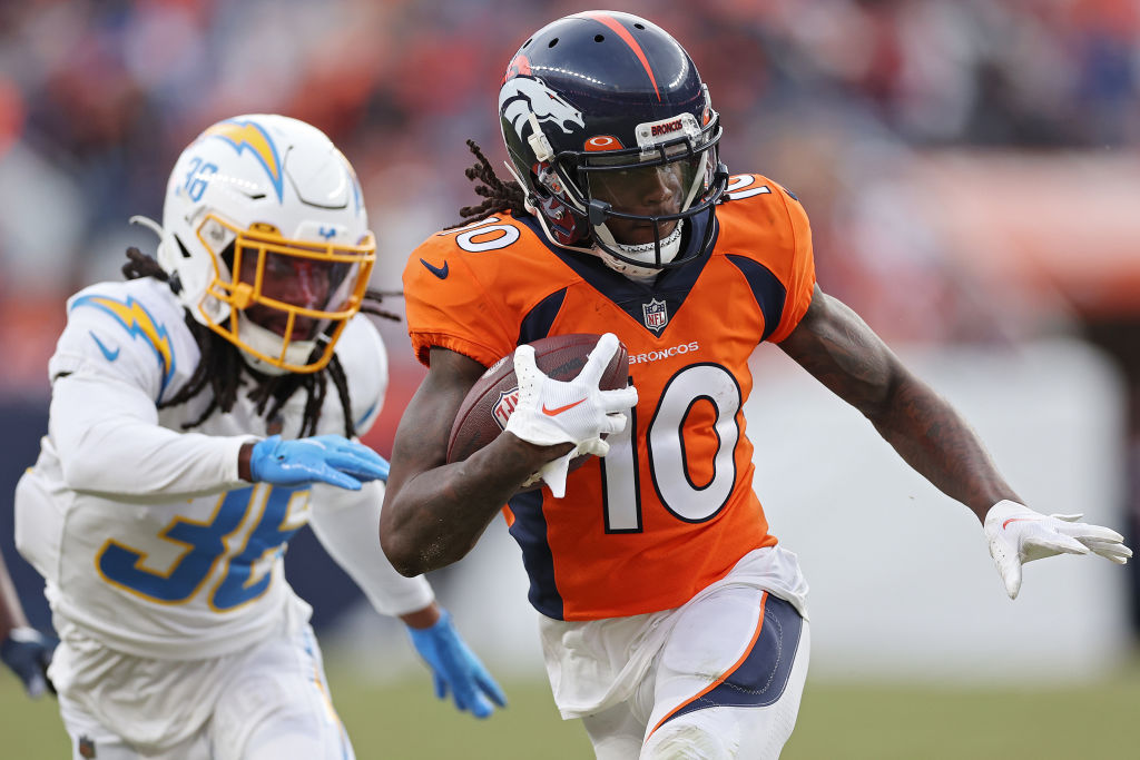 DENVER, COLORADO - JANUARY 08: Jerry Jeudy #10 of the Denver Broncos runs past Ja'Sir Taylor #36 of the Los Angeles Chargers during the third quarter at Empower Field At Mile High on January 08, 2023 in Denver, Colorado. (Photo by Matthew Stockman/Getty Images)
