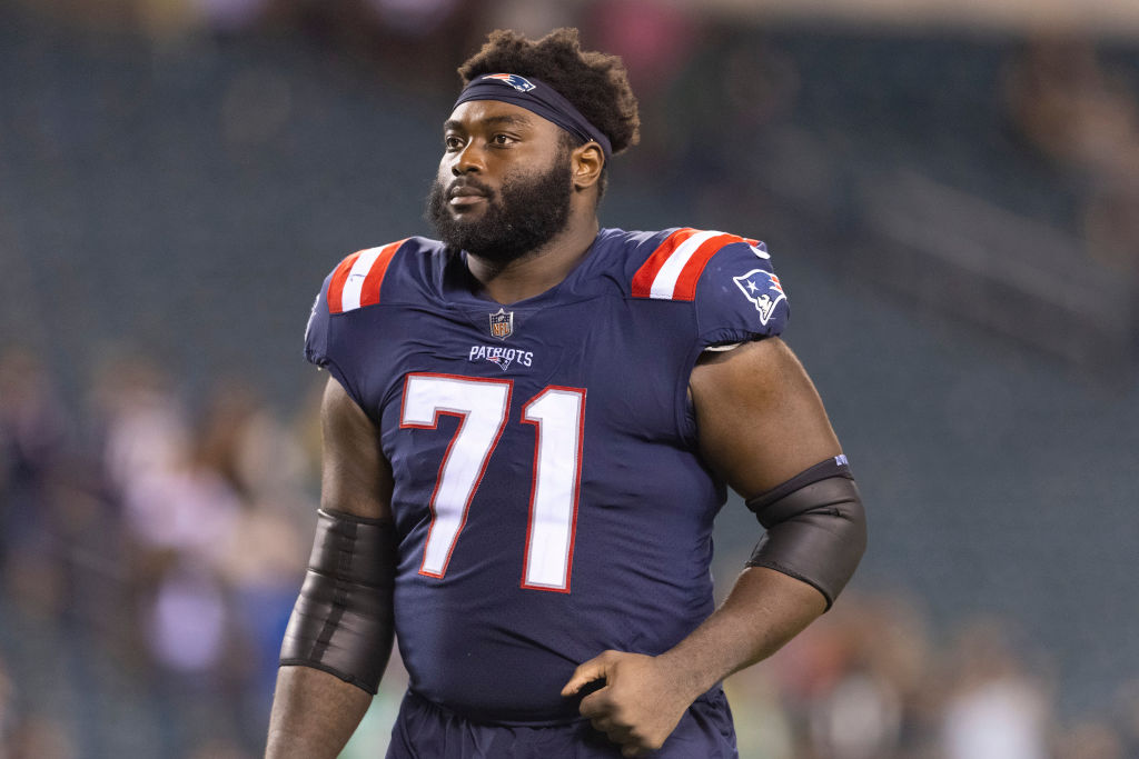 PHILADELPHIA, PA - AUGUST 19: Mike Onwenu #71 of the New England Patriots walks off the field after the preseason game against the Philadelphia Eagles at Lincoln Financial Field on August 19, 2021 in Philadelphia, Pennsylvania. The Patriots defeated the Eagles 35-0. (Photo by Mitchell Leff/Getty Images)