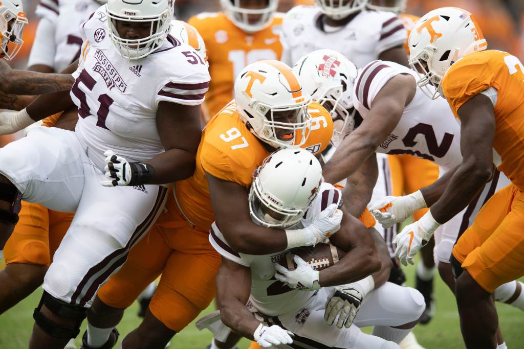 Tennessee defensive lineman Darel Middleton (97) pulls down Mississippi State running back Nick Gibson (21) on Saturday, October 12, 2019. (Saul Young/News Sentinel via Imagn Content Services)