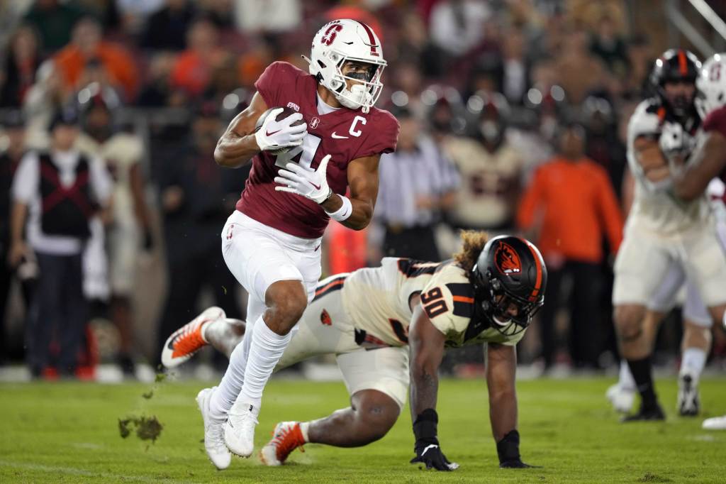 Oct 8, 2022; Stanford, California, USA; Stanford Cardinal wide receiver Michael Wilson (4) carries the ball against the Oregon State Beavers during the first quarter at Stanford Stadium. Credit: Darren Yamashita-USA TODAY Sports