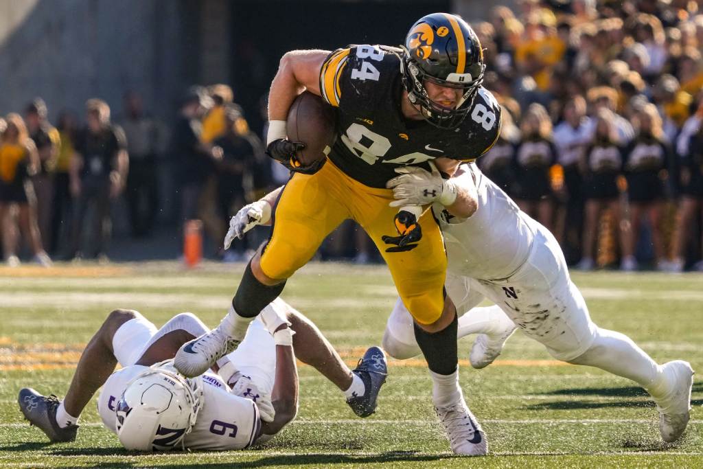 Iowa tight end Sam LaPorta (84) runs after a catch as the Wildcats take on the Hawkeyes at Kinnick Stadium in Iowa City, Saturday, Oct. 29, 2022. (Zach Boyden-Holmes/The Register/USA Today Network)