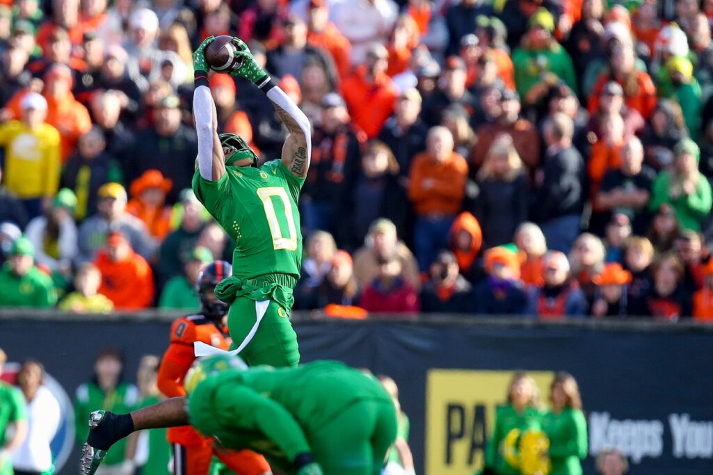 Oregon’s Christian Gonzalez hauls in an interception as the No. 9 Oregon Ducks take on the No. 21 Oregon State Beavers at Reser Stadium in Corvallis, Ore. Saturday, Nov. 26, 2022. (Ben Lonergan/The Register-Guard/USA Today Network)