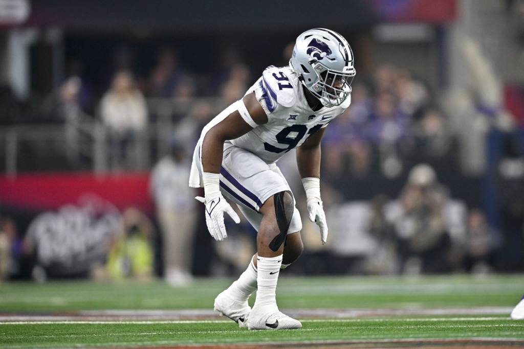 Dec 3, 2022; Arlington, TX, USA; Kansas State Wildcats defensive end Felix Anudike-Uzomah (91) in action during the game between the TCU Horned Frogs and the Kansas State Wildcats at AT&T Stadium. Credit: Jerome Miron-USA TODAY Sports