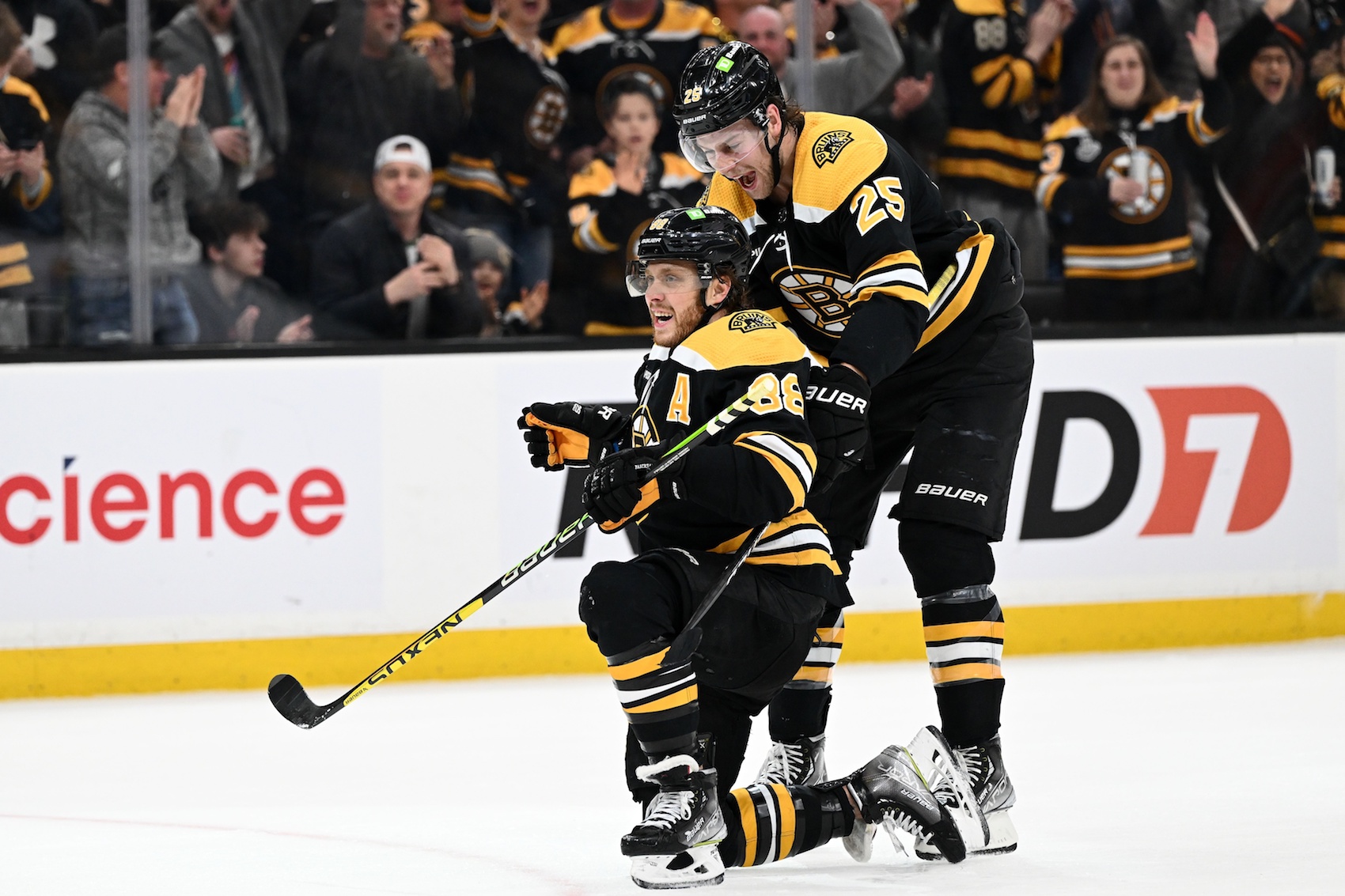 Mar 9, 2023; Boston, Massachusetts, USA; Boston Bruins right wing David Pastrnak (88) celebrates with defenseman Brandon Carlo (25) after scoring a goal against the Edmonton Oilers during the first period at the TD Garden. Mandatory Credit: Brian Fluharty-USA TODAY Sports