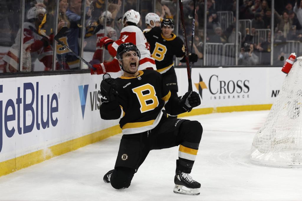 Mar 11, 2023; Boston, Massachusetts, USA; Boston Bruins right wing Garnet Hathaway (21) celebrates his go ahead goal against the Detroit Red Wings during the third period at TD Garden. Mandatory Credit: Winslow Townson/USA TODAY Sports