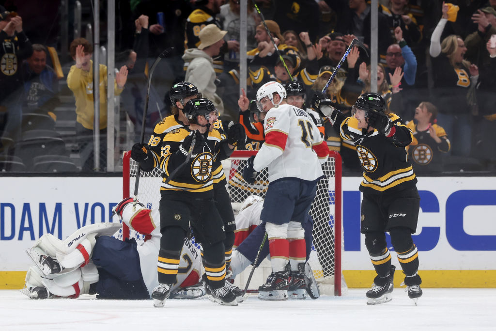 BOSTON, MASSACHUSETTS - APRIL 26: Brad Marchand #63 of the Boston Bruins celebrates with Tyler Bertuzzi #59 and David Pastrnak #88 after scoring a goal on Sergei Bobrovsky #72 of the Florida Panthers during the second period in Game Five of the First Round of the 2023 Stanley Cup Playoffs at TD Garden on April 26, 2023 in Boston, Massachusetts. (Photo by Maddie Meyer/Getty Images)