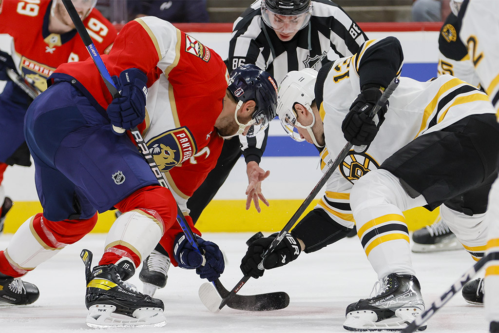 Apr 21, 2023; Sunrise, Florida, USA; Florida Panthers center Aleksander Barkov (16) and Boston Bruins center Charlie Coyle (13) face-off during the first period in game three of the first round of the 2023 Stanley Cup Playoffs at FLA Live Arena. Mandatory Credit: Sam Navarro-USA TODAY Sports