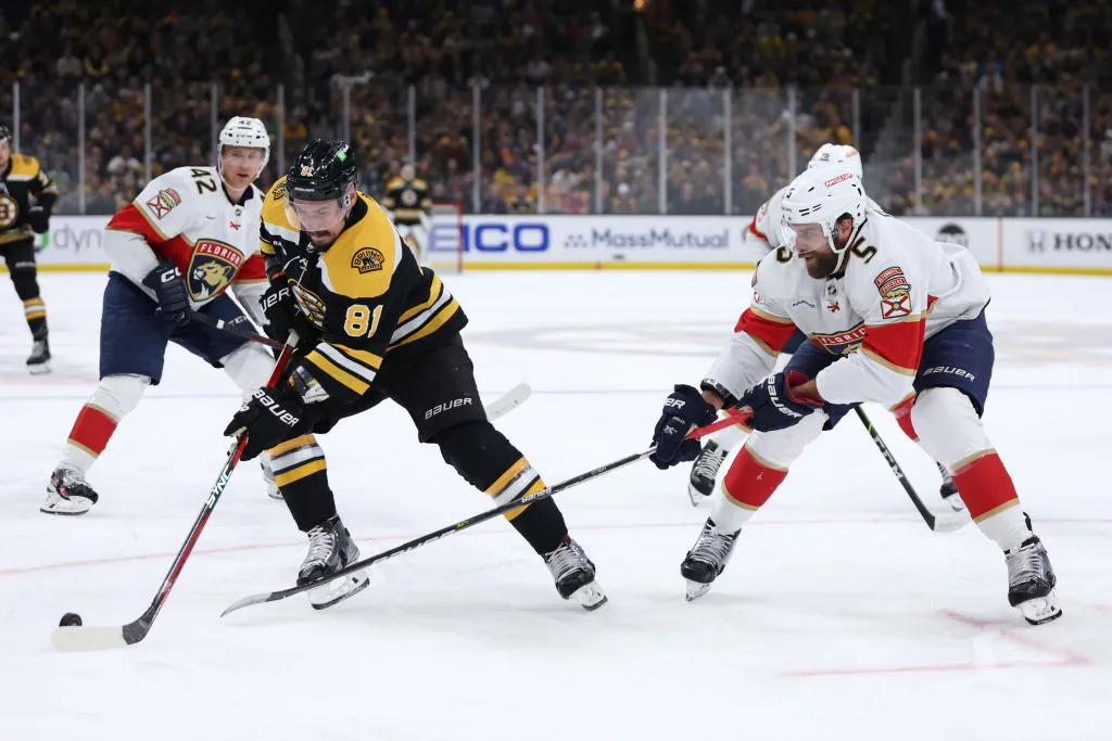 BOSTON, MASSACHUSETTS - APRIL 30: Aaron Ekblad #5 of the Florida Panthers defends Dmitry Orlov #81 of the Boston Bruins during the first period in Game Seven of the First Round of the 2023 Stanley Cup Playoffs at TD Garden on April 30, 2023 in Boston, Massachusetts. (Photo by Maddie Meyer/Getty Images)