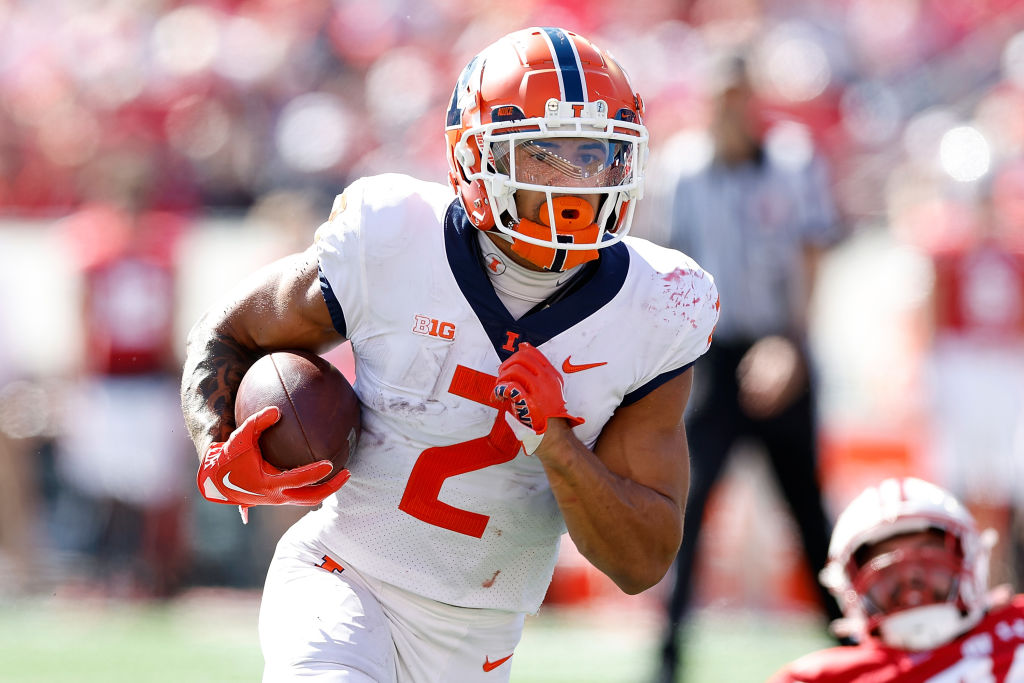 MADISON, WISCONSIN - OCTOBER 01: Chase Brown #2 of the Illinois Fighting Illini rushes the ball in the fourth quarter against the Wisconsin Badgers at Camp Randall Stadium on October 01, 2022 in Madison, Wisconsin. (Photo by John Fisher/Getty Images)