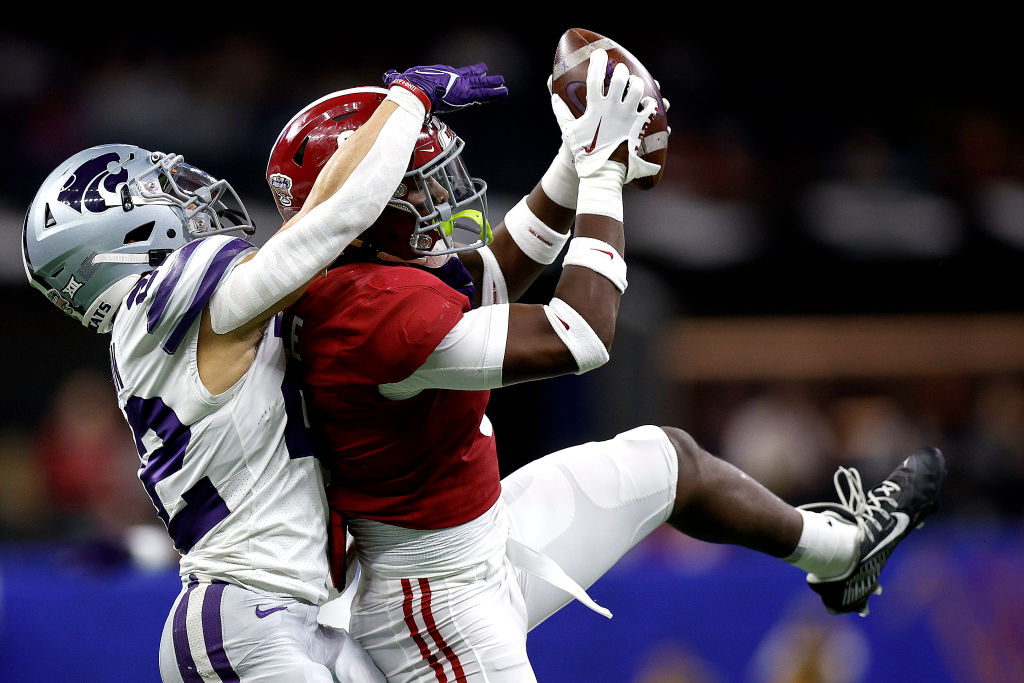 NEW ORLEANS, LOUISIANA - DECEMBER 31: Jordan Battle #9 of the Alabama Crimson Tide intercepts a pass to Deuce Vaughn #22 of the Kansas State Wildcats during the first quarter of the Allstate Sugar Bowl at Caesars Superdome on December 31, 2022 in New Orleans, Louisiana. (Photo by Sean Gardner/Getty Images)